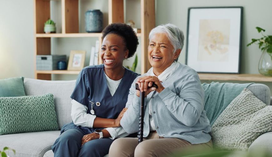 Caregiver providing temporary home care for a senior while family is away