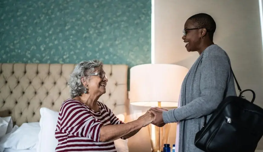 Temporary caregiver supporting a senior while family is away